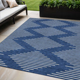 5' X 8' Navy Blue And Ivory Geometric Washable Indoor Outdoor Area Rug
