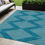 5' X 8' Teal Blue And Ivory Geometric Washable Indoor Outdoor Area Rug
