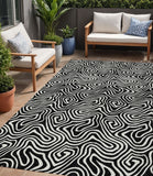 5' X 8' Black And Ivory Abstract Washable Indoor Outdoor Area Rug
