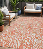 5' X 8' Salmon And Ivory Abstract Washable Indoor Outdoor Area Rug