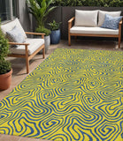 5' X 8' Yellow And Blue Abstract Washable Indoor Outdoor Area Rug