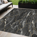5' X 8' Black Ivory And Gold Abstract Washable Indoor Outdoor Area Rug