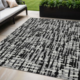 5' X 8' Black Gray And Ivory Abstract Washable Indoor Outdoor Area Rug
