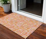3' X 5' Orange Pink And Beige Abstract Washable Indoor Outdoor Area Rug