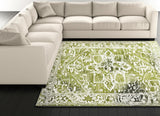 7' X 9' Green And Beige Tribal Washable Area Rug With UV Protection