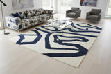 5' X 7' Beige And Blue Abstract Washable Area Rug With UV Protection