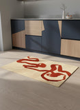 5' Beige And Red Abstract Washable Round Rug With UV Protection