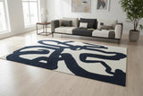 8' Beige And Blue Abstract Washable Round Rug With UV Protection