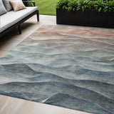 5' X 8' Teal Blue And Peach Abstract Washable Indoor Outdoor Area Rug
