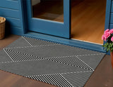 3' X 5' Black And Ivory Geometric Washable Indoor Outdoor Area Rug