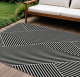 8' X 10' Black And Ivory Geometric Washable Indoor Outdoor Area Rug