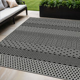 5' X 8' Black And Ivory Chevron Washable Indoor Outdoor Area Rug