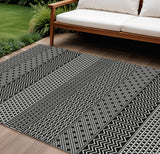 8' X 10' Black And Ivory Chevron Washable Indoor Outdoor Area Rug