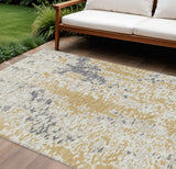 8' X 10' Gold And Ivory Abstract Washable Indoor Outdoor Area Rug