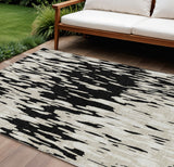 8' X 10' Black And Ivory Abstract Washable Indoor Outdoor Area Rug