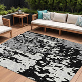 8' X 10' Black And Ivory Abstract Washable Indoor Outdoor Area Rug