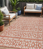 5' X 8' Salmon And Ivory Geometric Washable Indoor Outdoor Area Rug