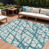8' X 10' Teal Blue And Ivory Abstract Washable Indoor Outdoor Area Rug