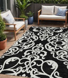 5' X 8' Black And Ivory Damask Washable Indoor Outdoor Area Rug