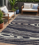 5' X 8' Black Taupe And Beige Faux Bois Washable Indoor Outdoor Area Rug