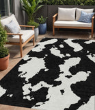 5' X 8' Black And Ivory Abstract Washable Indoor Outdoor Area Rug