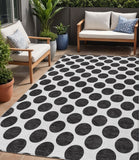 5' X 8' Black And Ivory Polka Dot Washable Indoor Outdoor Area Rug