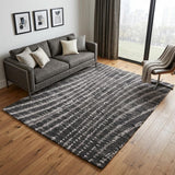 5' X 8' Black Gray And Ivory Abstract Area Rug
