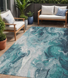 5' X 8' Teal Blue And Ivory Abstract Washable Indoor Outdoor Area Rug
