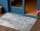 3' X 5' Blue And Ivory Abstract Washable Indoor Outdoor Area Rug