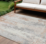 8' X 10' Coral And Ivory Abstract Washable Indoor Outdoor Area Rug