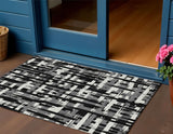3' X 5' Black Gray And Ivory Striped Washable Indoor Outdoor Area Rug