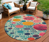 8' Teal Blue Pink And Orange Round Geometric Washable Indoor Outdoor Area Rug