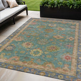 5' X 8' Teal Blue And Gold Floral Washable Indoor Outdoor Area Rug