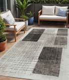 5' X 8' Ivory And Black Geometric Washable Indoor Outdoor Area Rug