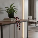 40" Black Red And White Wood Hand Painted Decorative Tassel