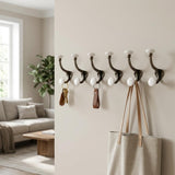 Set of Six Bronze And White Cast Iron And Ceramic Double Wall Hooks