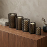 Set of Five Dark Brown Pierced Geometric Metal Tabletop Hurricane Candle Holders