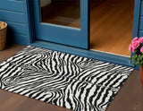 3' X 5' Black And Ivory Zebra Print Washable Indoor Outdoor Area Rug