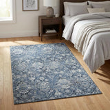 3' X 5' Blue And Ivory Floral Medallion Distressed Washable Area Rug With UV Protection