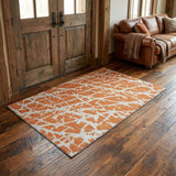 3' X 5' Orange And Ivory Abstract Washable Area Rug With UV Protection