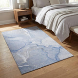 3' X 5' Blue And Ivory Abstract Washable Area Rug With UV Protection