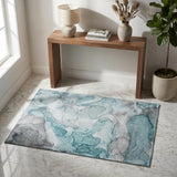 3' X 5' Teal And Ivory Abstract Washable Area Rug With UV Protection