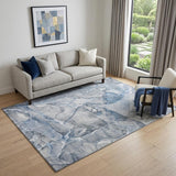 5' X 8' Blue And Ivory Abstract Washable Area Rug With UV Protection