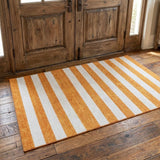 3' X 5' Orange And Ivory Striped Washable Area Rug With UV Protection