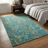3' X 5' Teal Green And Gold Paisley Washable Area Rug With UV Protection