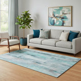 5' X 8' Teal And Ivory Abstract Washable Area Rug With UV Protection