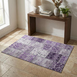 3' X 5' Purple And Ivory Patchwork Distressed Washable Area Rug With UV Protection