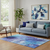 5' X 8' Blue Purple And Ivory Abstract Washable Area Rug With UV Protection