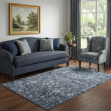 5' X 8' Blue And Ivory Oriental Washable Area Rug With UV Protection