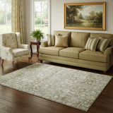 5' X 8' Taupe Ivory And Gold Oriental Washable Area Rug With UV Protection